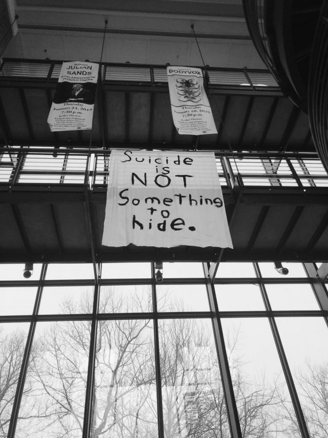Posters and banners that said Suicide is NOT something to hide were hung up around campus this week. Photo by Joe OConnor, 22.