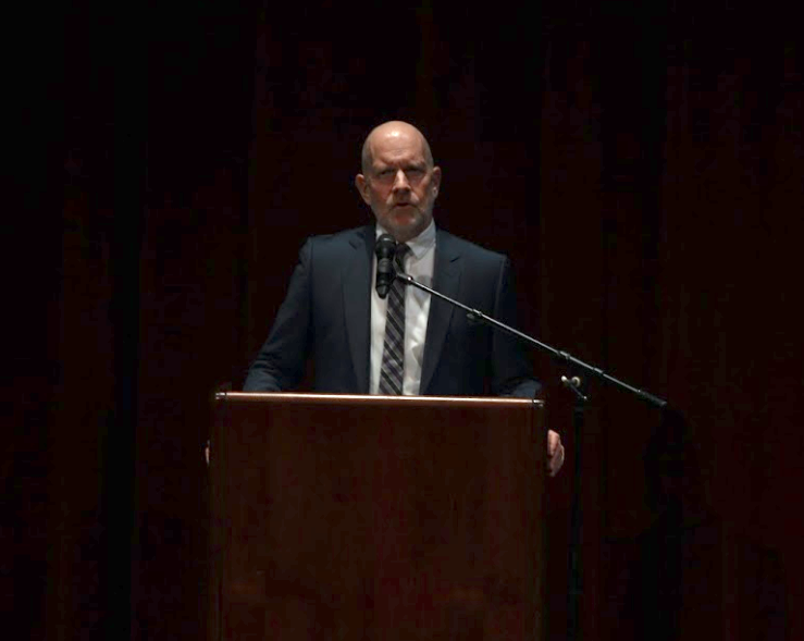 Mike Henry addresses the audience in Stackhouse Theater. Photo by Samantha Weed.