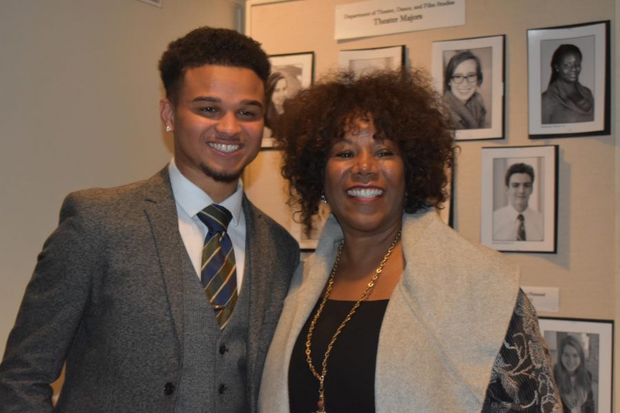 Garrett Clinton, 20, poses with Ruby Bridges after he read an introduction for her keynote address on Jan. 19. Photo by Hannah Denham.