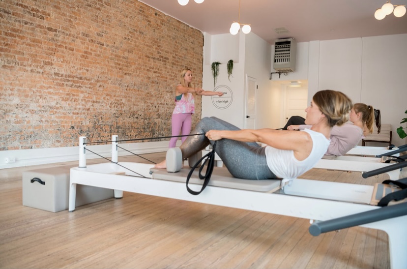 Pilates students use a reformer, an appara-tus with tension pulleys meant to challenge the body. Photo courtesy of Kevin Remington.