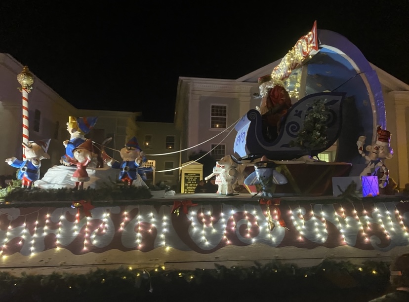 A float with Santa and Mrs. Claus proceeded down Main Street as part of Lexington’s Christmas parade. The annual event was downsized last year due to COVID-19. Photo by Shauna Muckle, ’24.