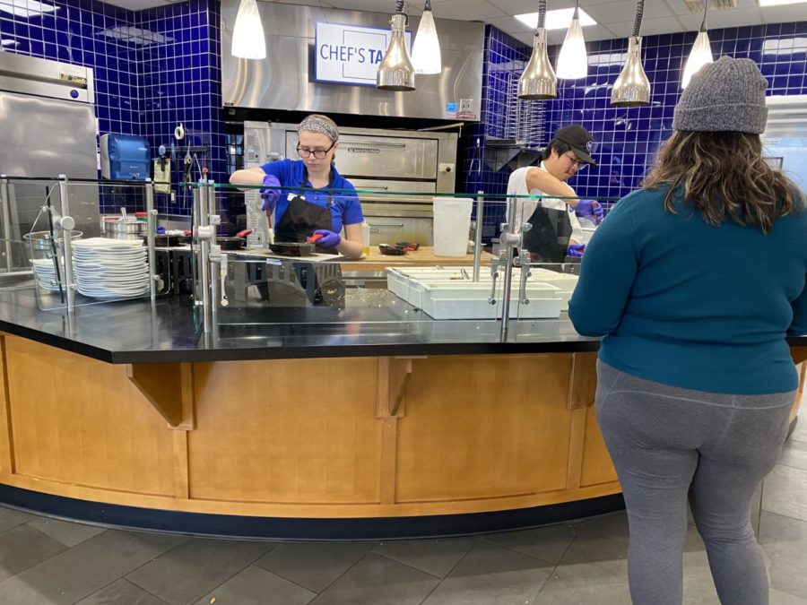 Masks are no longer required in campus buildings. Dining hall staff worked without masks this week for the first time in almost two years. Photo by Elena Lee, ’25.