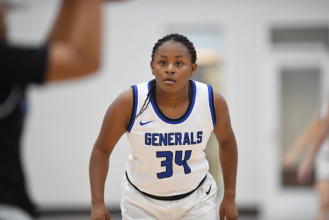 Womens basketball co-captain Tahri Phillips, ’23, stays focused on what’s in sight. 