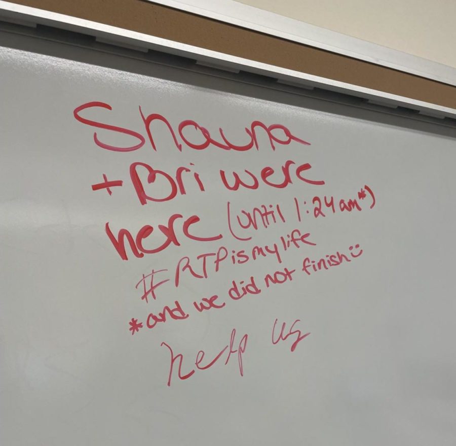 A+whiteboard+with+writing+on+it+in+red+marker+that+reads%3A+Shauna+%2B+Bri+were+here+until+1%3A24+am+%23RTPismylife+and+we+did+not+finish+help+us