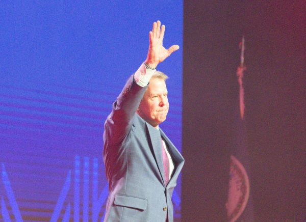 Georgia Governor Brian Kemp waves to the audience after sharing his thoughts on the future of the Republican Party.