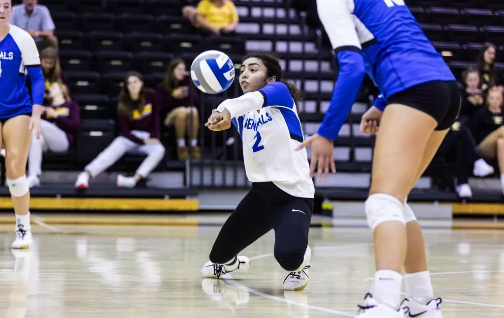 Vivi Vasquez, ‘27,  digs the ball versus Carnegie Mellon University in a 3-2 win. Vasquez broke the school record for digs in a single game.