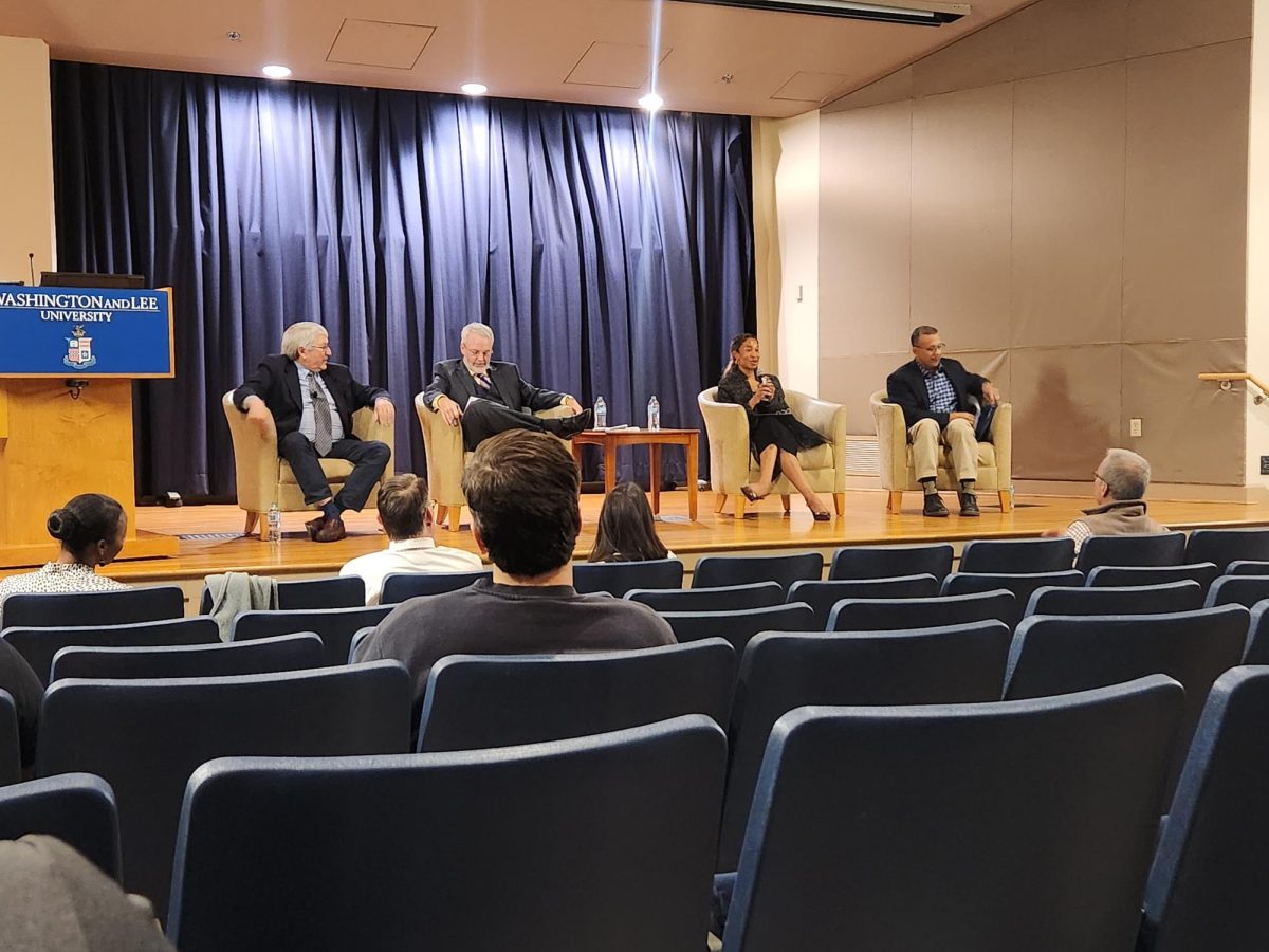 Bob Strong, Kevin Finch, Maureen Edobor and Lucas Morel discuss election results at Stackhouse Theater. 