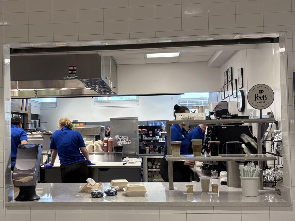 Workers prepare orders at Coop. 