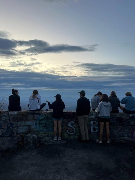 Students converse after a morning hike with the Outing Club at North Mountain.